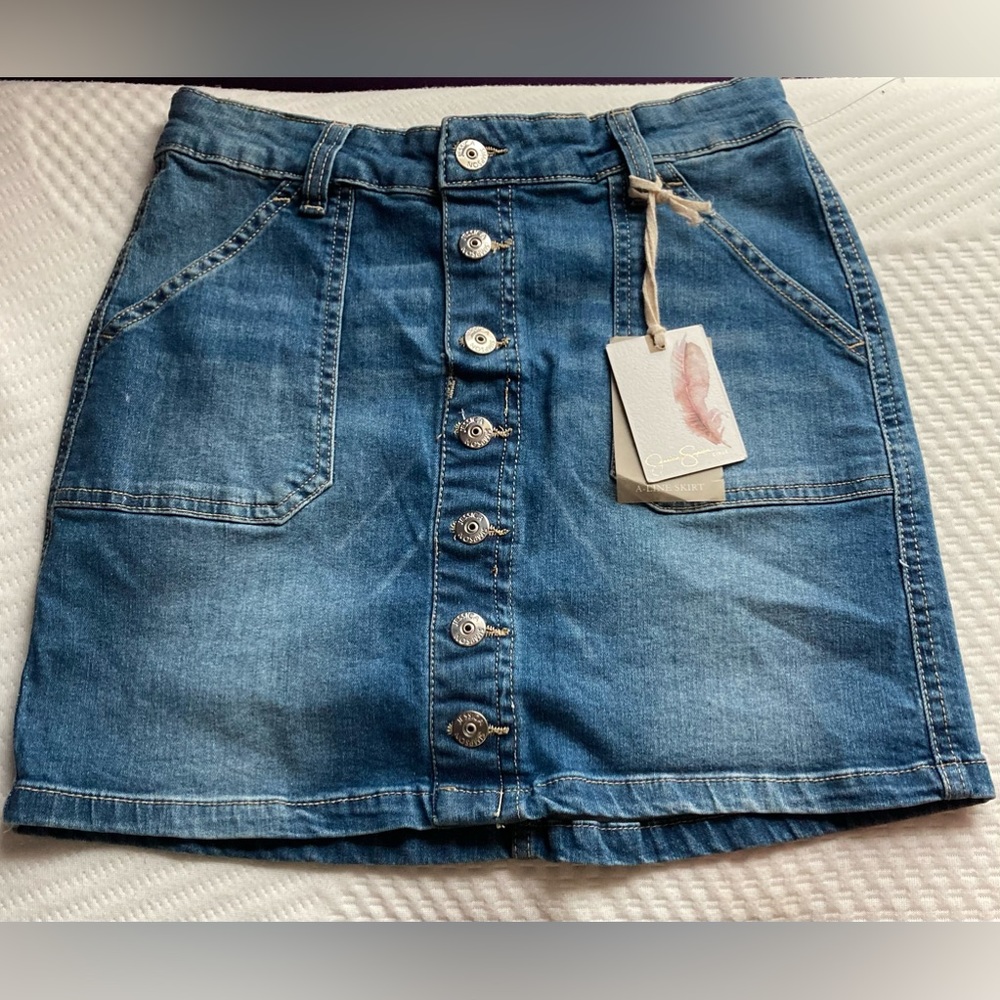 This is a never worn Jessica Simpson button skirt.
